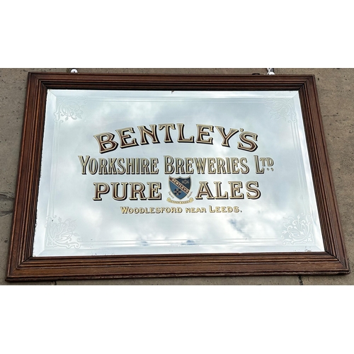 50 - BENTLEYS YORKSHIRE BREWERIES LTD PURE ALES MIRROR. 36 x 24.5 ins wooden frame. An impressive, heavy,... 