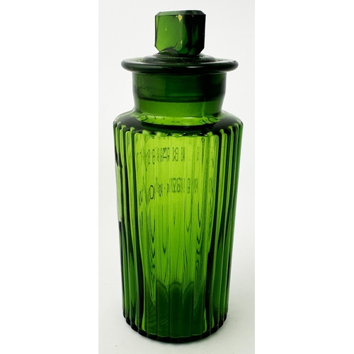 62 - RIBBED SHOP ROUND BOTTLE. (DP p153). 5.5ins tall. Bright green glass, vertical body ribs, wide neck,... 