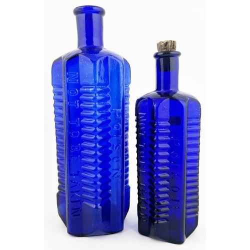 64 - STAR POISON BOTTLE. (DP pg 58). 8.4ins tall, cobalt blue glass, long neck, star section with flat ba... 