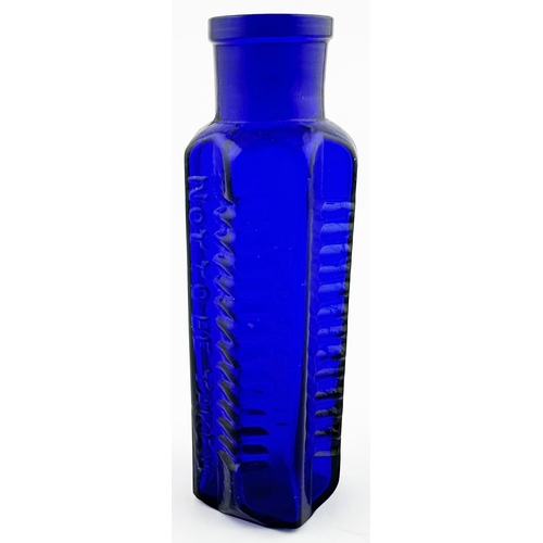 67 - WIDE MOUTH STAR POISON BOTTLE. DP p58. 4.9ins tall. Vibrant cobalt blue, square base section with th... 