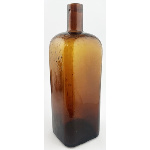 71 - WM RADAMS MICROBE KILLER BOTTLE. 10.2ins tall. Deep amber glass rectangular shape. Crude embossing (... 