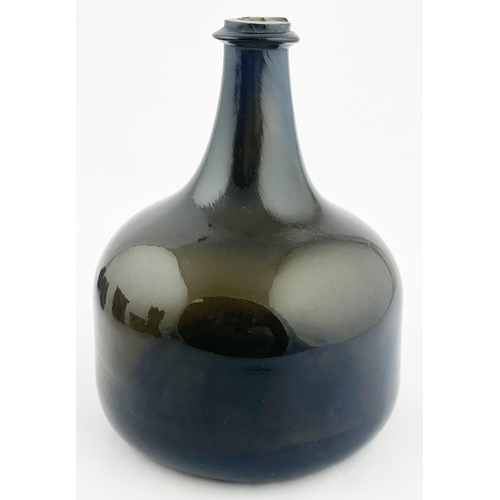 160 - ENGLISH MALLET BOTTLE. 6.9ins tall. Something of an extraordinary phenomen. What appears as a classi... 