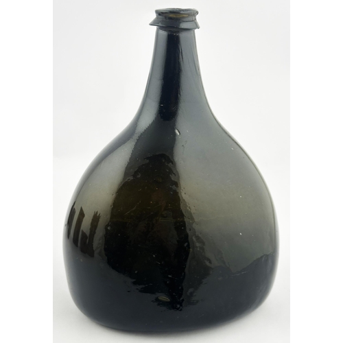 162 - ENGLISH BLADDER WINE BOTTLE. 7.8ins tall. Black, very dark green, glass, flat ovoid base shape with ... 