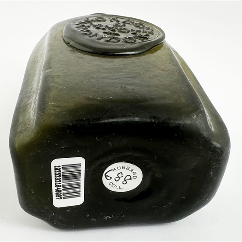 168 - LONDON SEALED UTILITY BOTTLE. 4.5ins tall. Very dark olive gree glass. Rectangular form with canted/... 