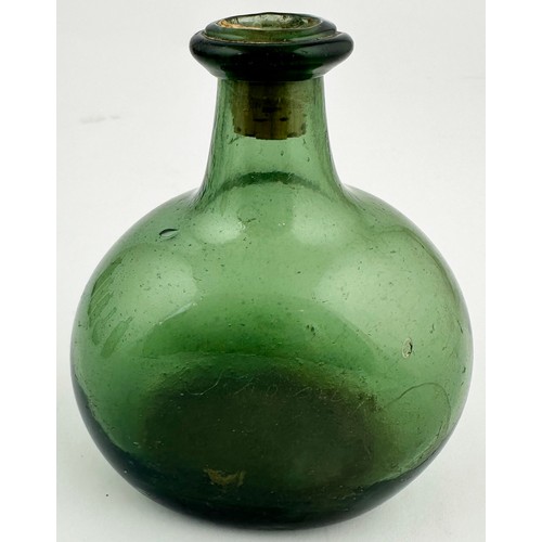 200 - FREE BLOWN APOTHECARY PHIAL. 4.1ins tall. Dark green rounded bodied. Hand inscribed on side Jnointop... 