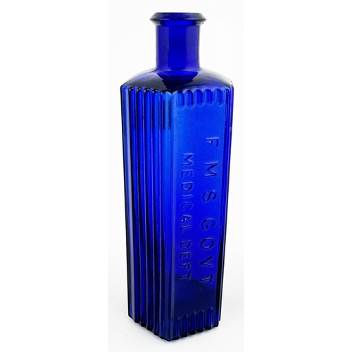 15 - F M S GOVT MEDICAL DEPT POISON BOTTLE. 6.3ins tall. Cobalt blue hexagonal shape, pointed lip. Vertic... 