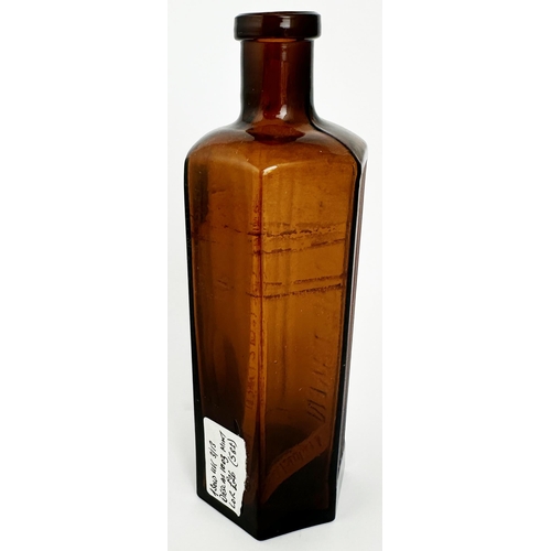 25 - HEXAGONAL POISON BOTTLE. 7.25ins tall. (DP p78) Amber glass, embossing to two panels POISON/ NOT TO ... 