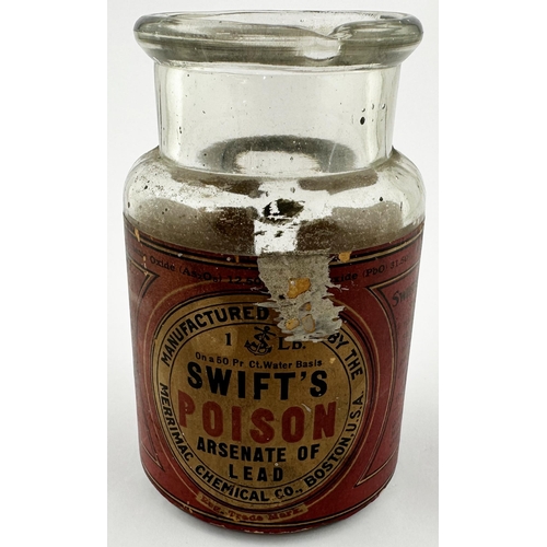 39 - BOSTON POISON BOTTLE. 4.75ins tall. Clear glass jar with paper label SWIFTS/ POISON/ ARSENATE OF/ LE... 