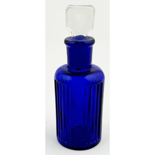 4 - BAILEY POISON BOTTLE. 3.9ins tall. (DP p67) Cobalt blue cylinder, clear glass stopper. Vertically ri... 