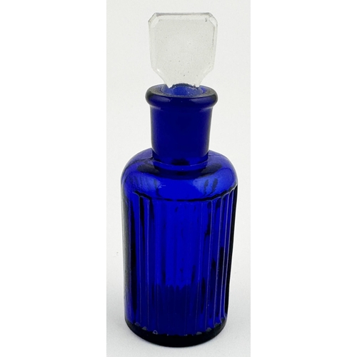 4 - BAILEY POISON BOTTLE. 3.9ins tall. (DP p67) Cobalt blue cylinder, clear glass stopper. Vertically ri... 