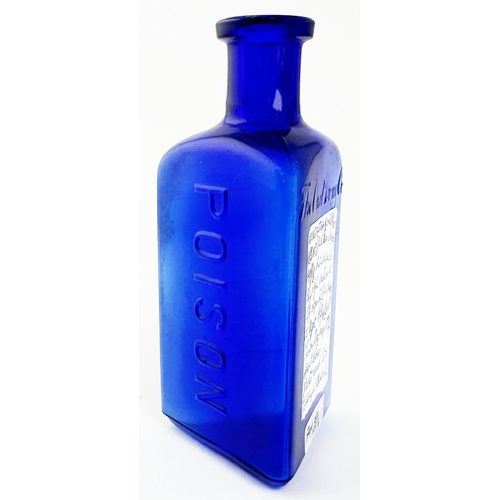 40 - THE OWL DRUG CO POISON BOTTLE. 5ins tall. Cobalt blue glass, triangular shape, embossed to all three... 