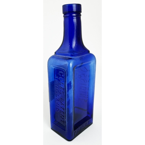 21 - COLES PATENT EMBROCATION POISON BOTTLE. 7.5ins tall. (DP p39) Cobalt blue, rectangular with sunken p... 