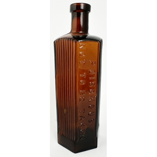 24 - HEXAGONAL POISON BOTTLE. 8.5ins tall. (DP p78) Amber glass, embossing to one panel POISONOUS/ NOT TO... 