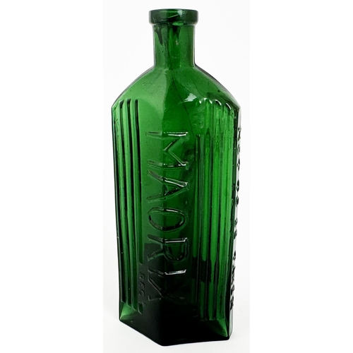 29 - MAORIX EMBROCATION BOTTLE. 6.3ins tall. (DP p39) Green glass, rough diamond shape with slim side edg... 