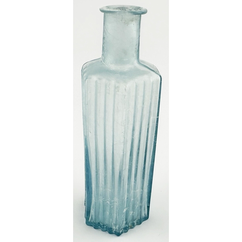 31 - TOOGOOD PATENT BOTTLE. (DP p48) Ice blue glass, vertically ribbed, base embossed TOOGOOD PATENT.