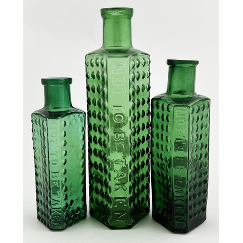 33 - TAYLORS PATENT POISON BOTTLE TRIO. (DP p55) Tallest 6ins Green glass, two studded walls, embossed ce... 