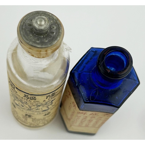 34 - HONG KONG POISON BOTTLE DUO. Tallest 5ins. Paper labels, one embossed KWAN LOONG & CO LTD. Worn. (2)