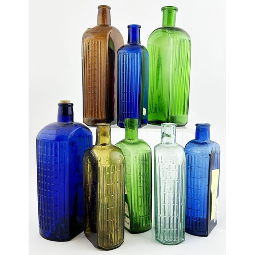 36 - CARBOLIC ACID POISON BOTTLE GROUP. (DP p146) Tallest 7.75ins. Various coloured glass with side verti... 