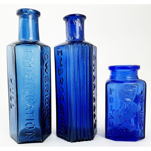 43 - HULL OWBRIDGES EMBROCATION BOTTLES DUO plus other. (DP p 97) Tallest 5ins. Cobalt blue, Embossed let... 