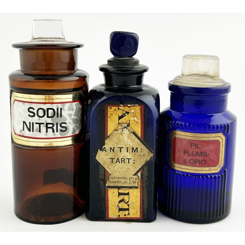 49 - CHEMIST ROUND TRIO. Tallest 5ins. Label under glass on two, paper label to other, all with stoppers.... 