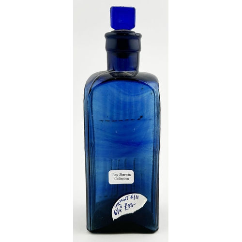 54 - ADMIRAL POISON BOTTLE. (DP p149) 6.5ins tall. Cobalt blue, square bodied with embossed arrow & capac... 