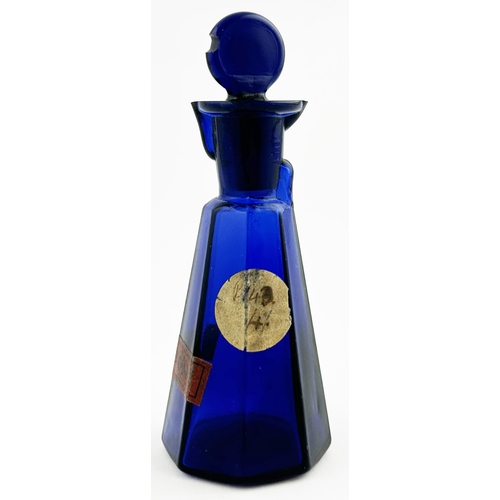 61 - WILSON PATENT POISON BOTTLE. (DP p110) 4.5ins tall. Cobalt blue glass, octagonal pyramid phial marke... 