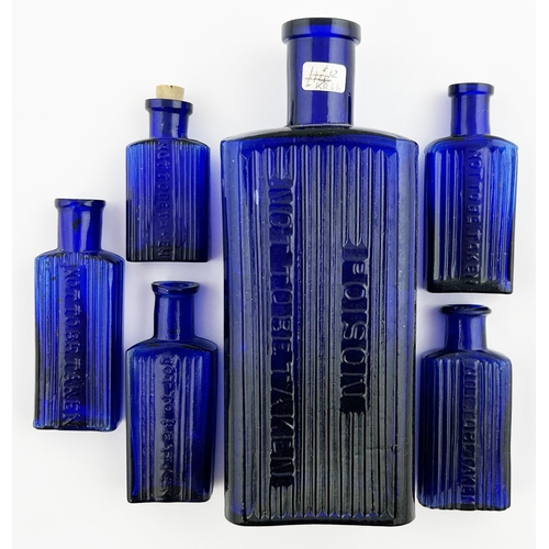 66 - POISON BOTTLE GROUP. Tallest 6.5ins. Cobalt blue, rectangular shape, various sizes, vertically ribbe... 