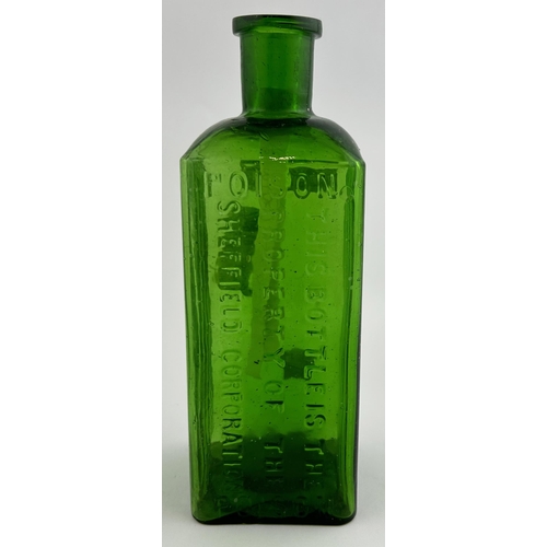 70 - SHEFFIELD CORPORATION POISON BOTTLE. (DP p120) 6.5ins tall. Green glass, square bodied, embossing to... 