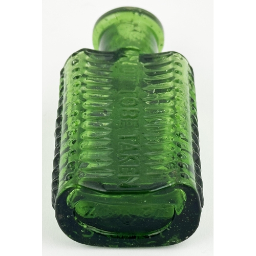 99 - FOULSTONS CRESCENT POISON BOTTLE. (DP p57, SF1). 3ins tall. Bright emerald green. Crescent section s... 