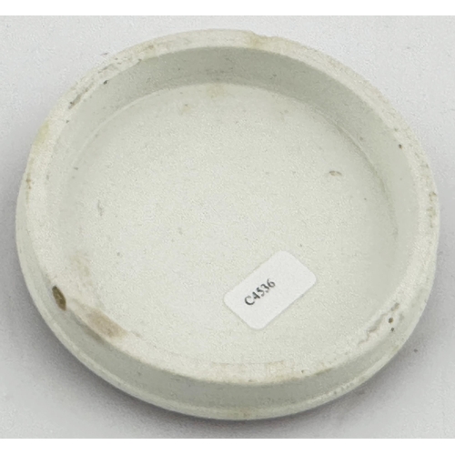 460 - LEAMINGTON POT LID. (APL p633, 31) 3.2ins diam. Black transfer with pink over-glaze background. Smal... 