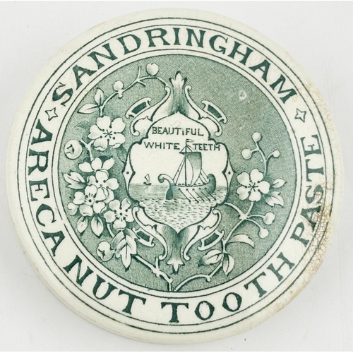 464 - LONDON POT LID. (APL p351, 59) 3ins diam. Green transfer with a floral design, boat to centre. This ... 