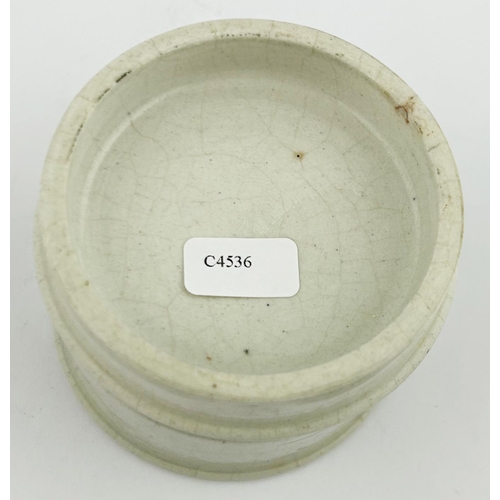 427 - OTTO OF ROSE COLD CREAM LID & BASE. 2.5ins diam. Vase of flowers to centre.