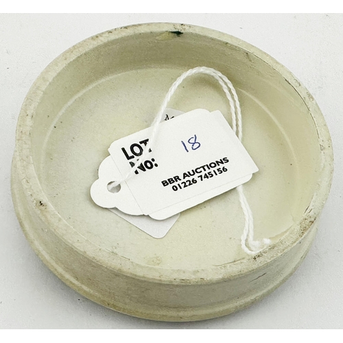 18 - EASTBOURNE POT LID. (APL pg596,75a) 3ins diam. Black transfer with oyster style border around severa... 