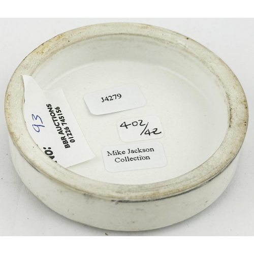 93 - LONDON POT LID. (APL pg402,42) 2.6ins diam. Fancy black transfer with AD border, writing on ribbon W... 