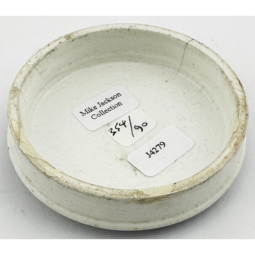 550 - LONDON POT LID. (APL p354, 90) 2.6ins diam. Black transfer with flower & ribbon border, smaller of t... 