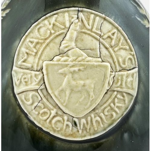 558 - MACKINLAYS WHISKY JUG. WG p120. Tallest 8ins. Blue/ green body with central plaque reading MACKINLAY... 