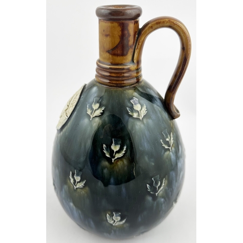 558 - MACKINLAYS WHISKY JUG. WG p120. Tallest 8ins. Blue/ green body with central plaque reading MACKINLAY... 