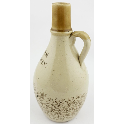 566 - SHAMROCK WHISKEY JUG. WG p168. 8.5ins tall. Tan top, sepia print. Lettering THE CREAM/ OF/ IRISH WHI... 