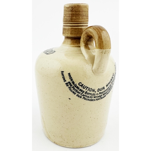 567 - THE GREYBEARD WHISKEY JUG. WG p133. 5.75ins tall. Tan top, black transfer THE GREYBEARD, very detail... 