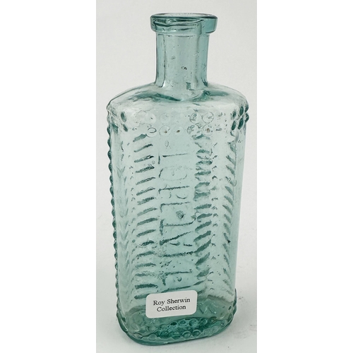 573 - . FOULSTONS CRESCENT POISON. (DP p57). 4.4ins tall (2oz size). Aqua glass. Familiar herrinbone angle... 