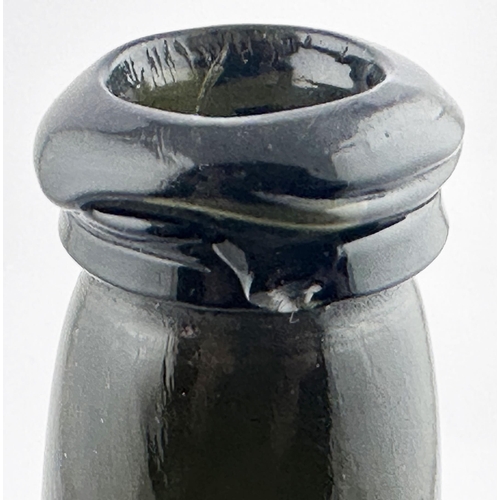 639 - CYLINDER WINE BOTTLE. 11ins tall. (Burton p1036) c1794-1800. Black/ dark olive glass. Long neck, dou... 