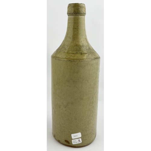 698 - BRIGG SLAB SEALED SPIRIT FLASK. 10ins tall. A substantial large size cylinder shape grey green slip ... 