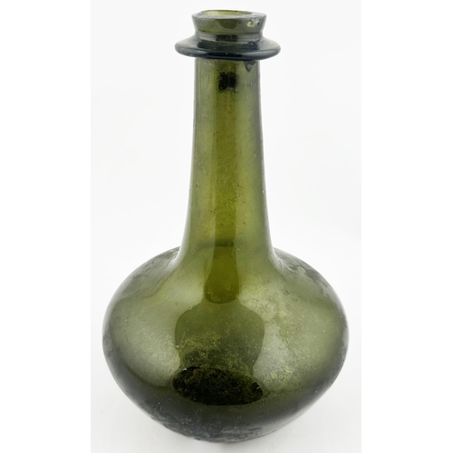 703 - ENGLISH SHAFT & GLOBE WINE BOTTLE. 9ins tall. Olive green glass, classic long neck, spherical body f... 