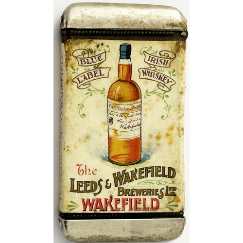 118 - LEEDS & WAKEFIELD BREWERIES BLUE LABEL SCOTCH WHISKY VESTA CASE. 1.4 x 2.6ins. Hinged top metal lid ... 