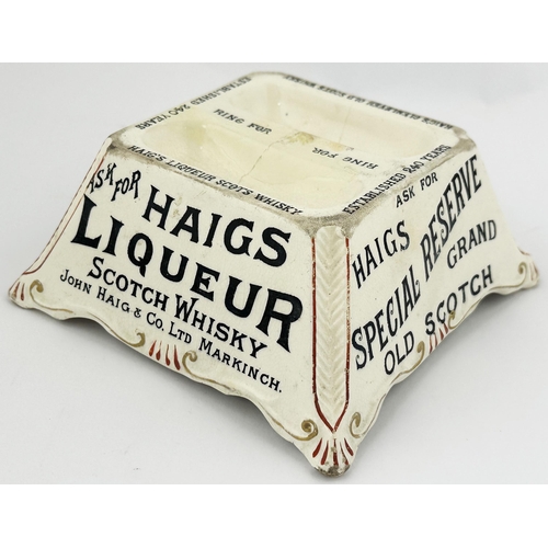 120 - HAIGS COUNTER BELL SHOP BASE. 5.5ins square. A most unusual striker featuring 4 different drink adve... 