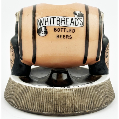 121 - WHITBREADS BOTTLED BEERS ASHTRAY STRIKER & MATCH HOLDER. 5ins base diam. Classic side laying barrel ... 