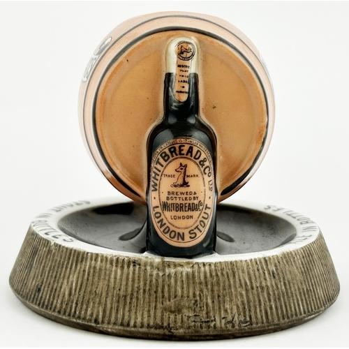 121 - WHITBREADS BOTTLED BEERS ASHTRAY STRIKER & MATCH HOLDER. 5ins base diam. Classic side laying barrel ... 