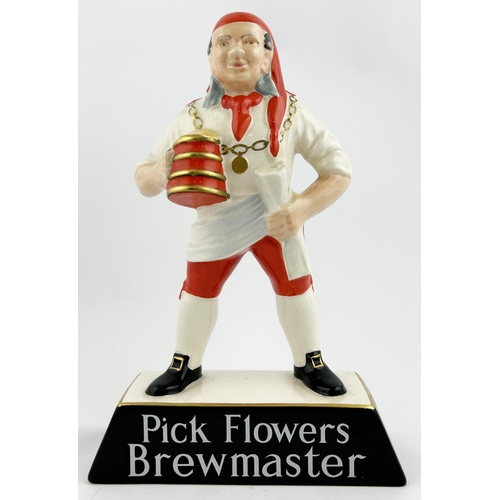 144 - PICK FLOWERS BREWMASTER ADVERTISING FIGURE. 9.3ins tall. Ceramic, dapperly dressed, brightly coloure... 