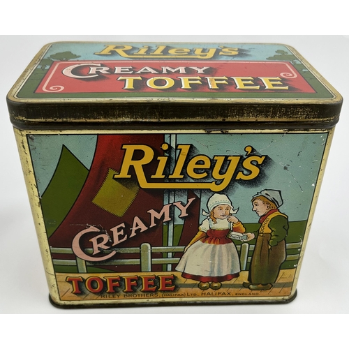 178 - RILEYS CREAMY TOFFEE HALIFAX TIN. 6.4 x 4.3 x 5.3ins. Dutch style pictorial of young boy giving a gi... 