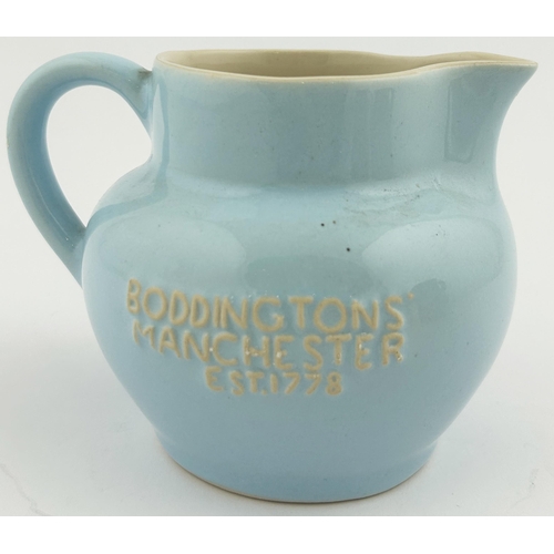 197 - BODDINGTONS MANCHESTER BALLANTRAE SPECIAL SCOTCH WATER JUG. 4ins tall. Pale blue exterior body glaze... 